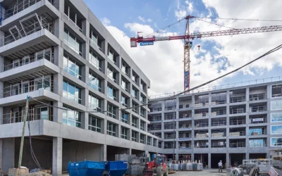 Créer une entreprise de construction à Genève : CCT, soumissions et frontaliers